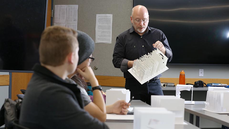 Students listening to an architecture class lecture