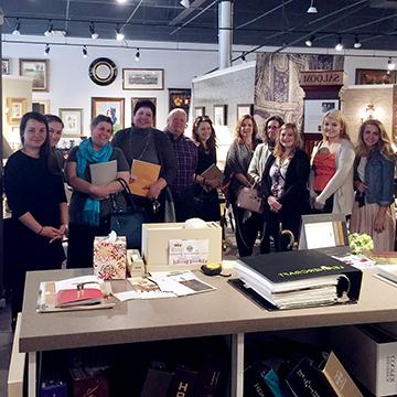 Student group photo at an interior design business